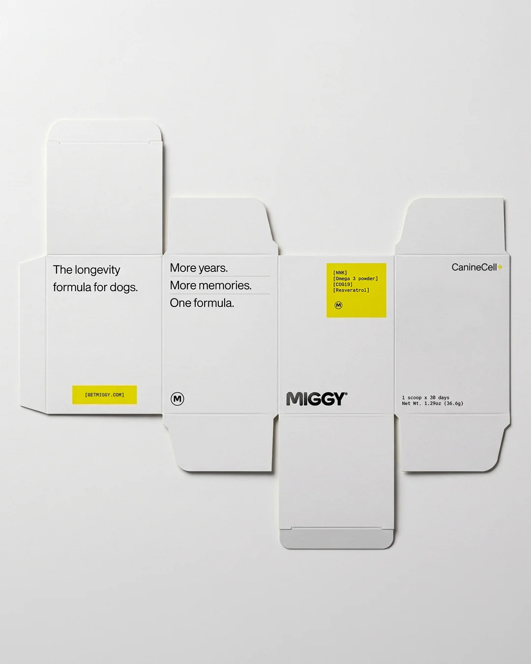 MIGGY — el packaging desplegado, en blanco con detalles en amarillo.